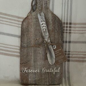 Rustic Wooden Cutting Board with Knife